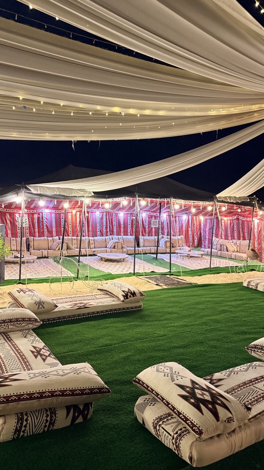 Traditional majlis seating at Jabel Al Sahra private desert camp
